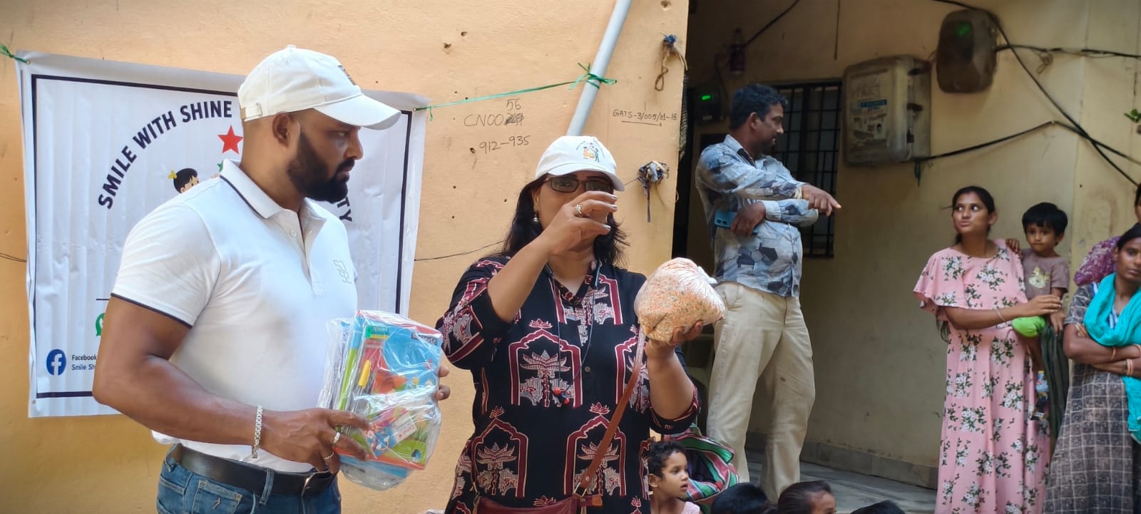 A child receiving a new school bag from Smile With Shine in Hyderabad