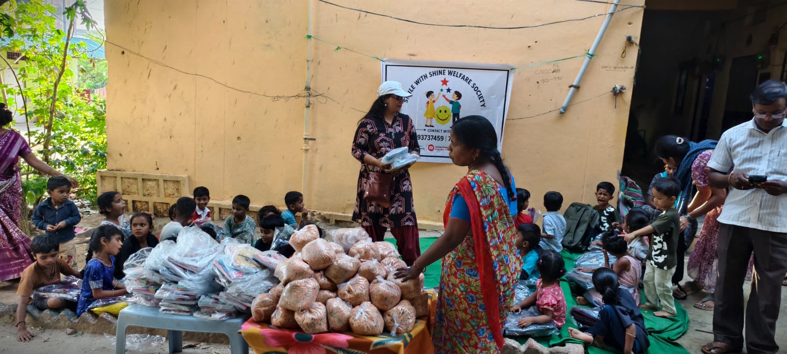 School bags being handed over to children in Hyderabad
