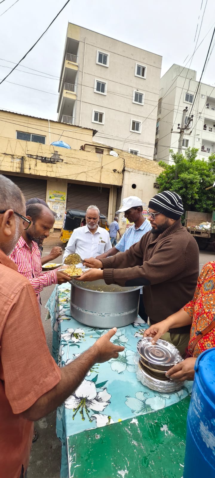 Hot freshly cooked breakfast being served to a person in need