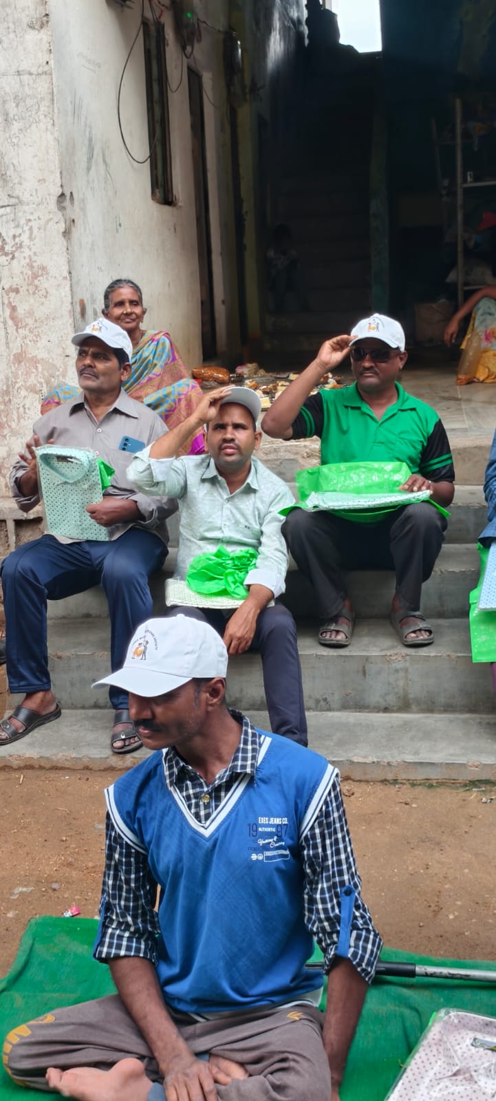An elderly father receiving cake and a new shirt on Father's Day 2026 in Hyderabad