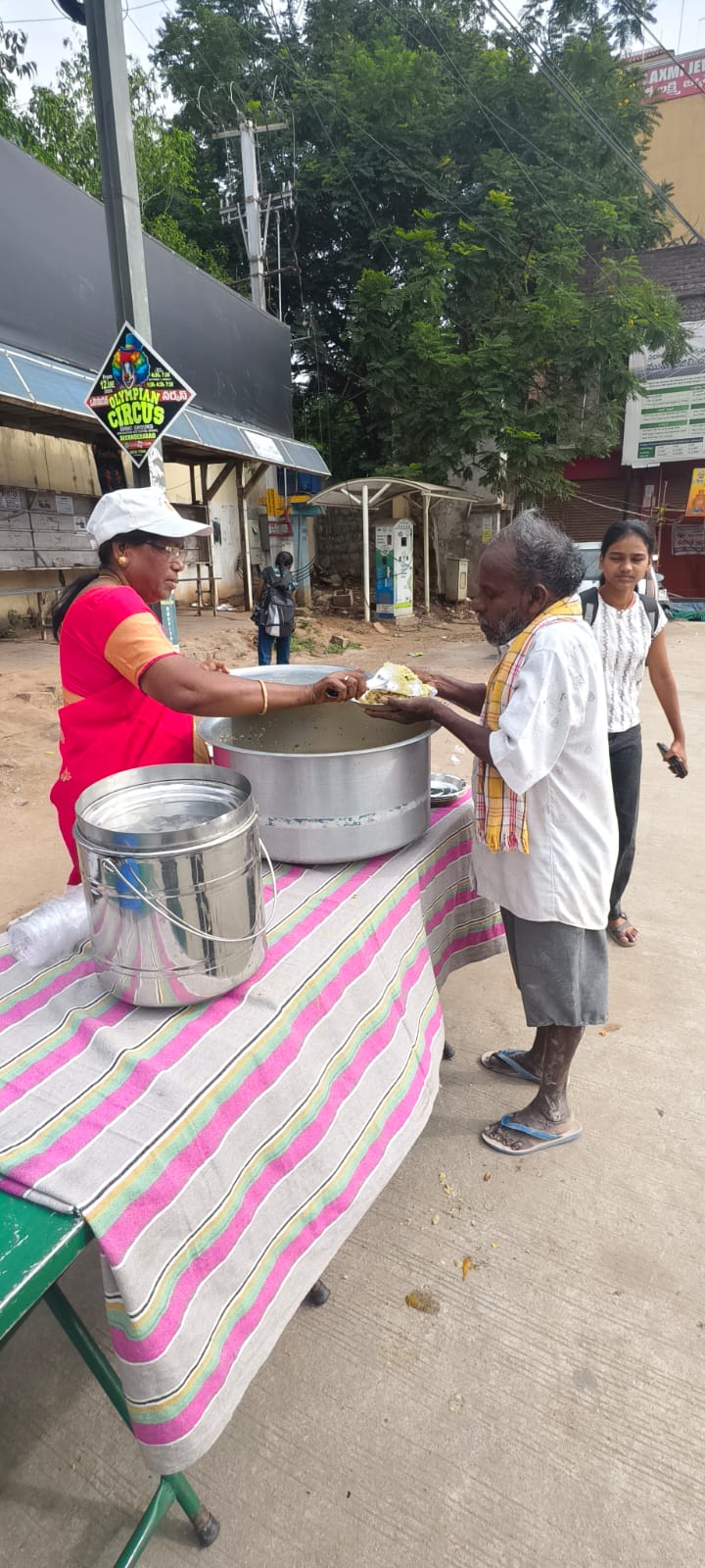 Smile With Shine Welfare Society serving warm breakfast on a Hyderabad roadside on Tuesday, June 30, 2026