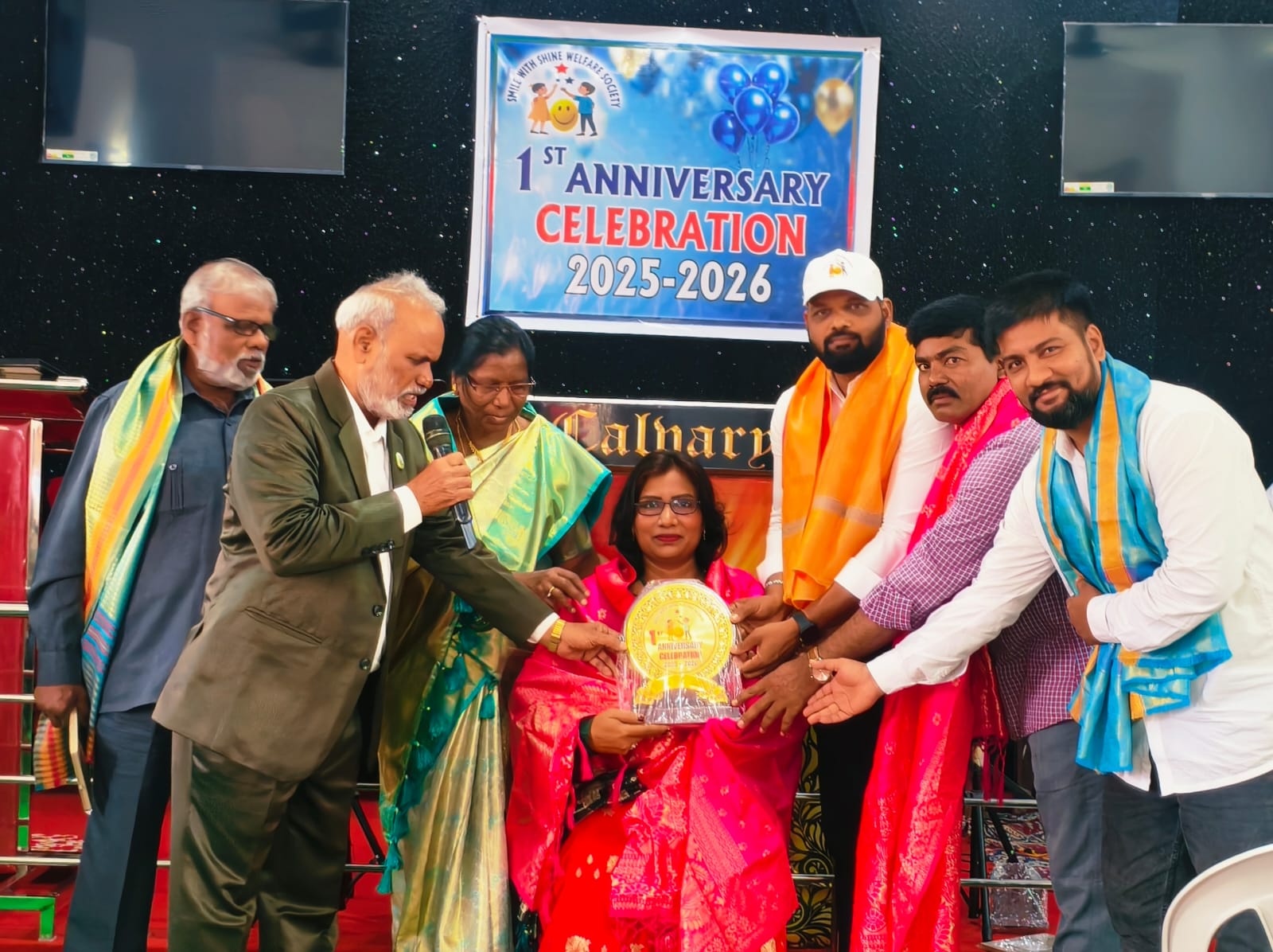 Founder Smt. Grace Mani being felicitated at the Smile With Shine Welfare Society 1st Anniversary Celebration, Hyderabad, 6 July 2026