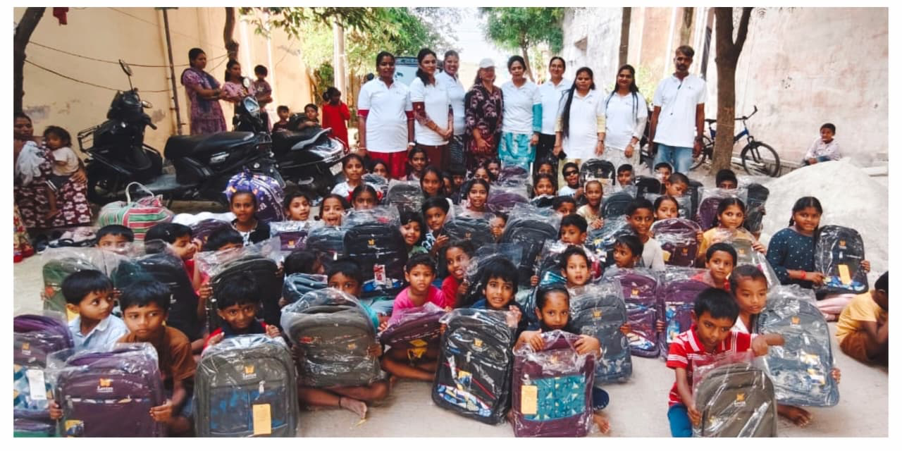 Kids posing with school bags